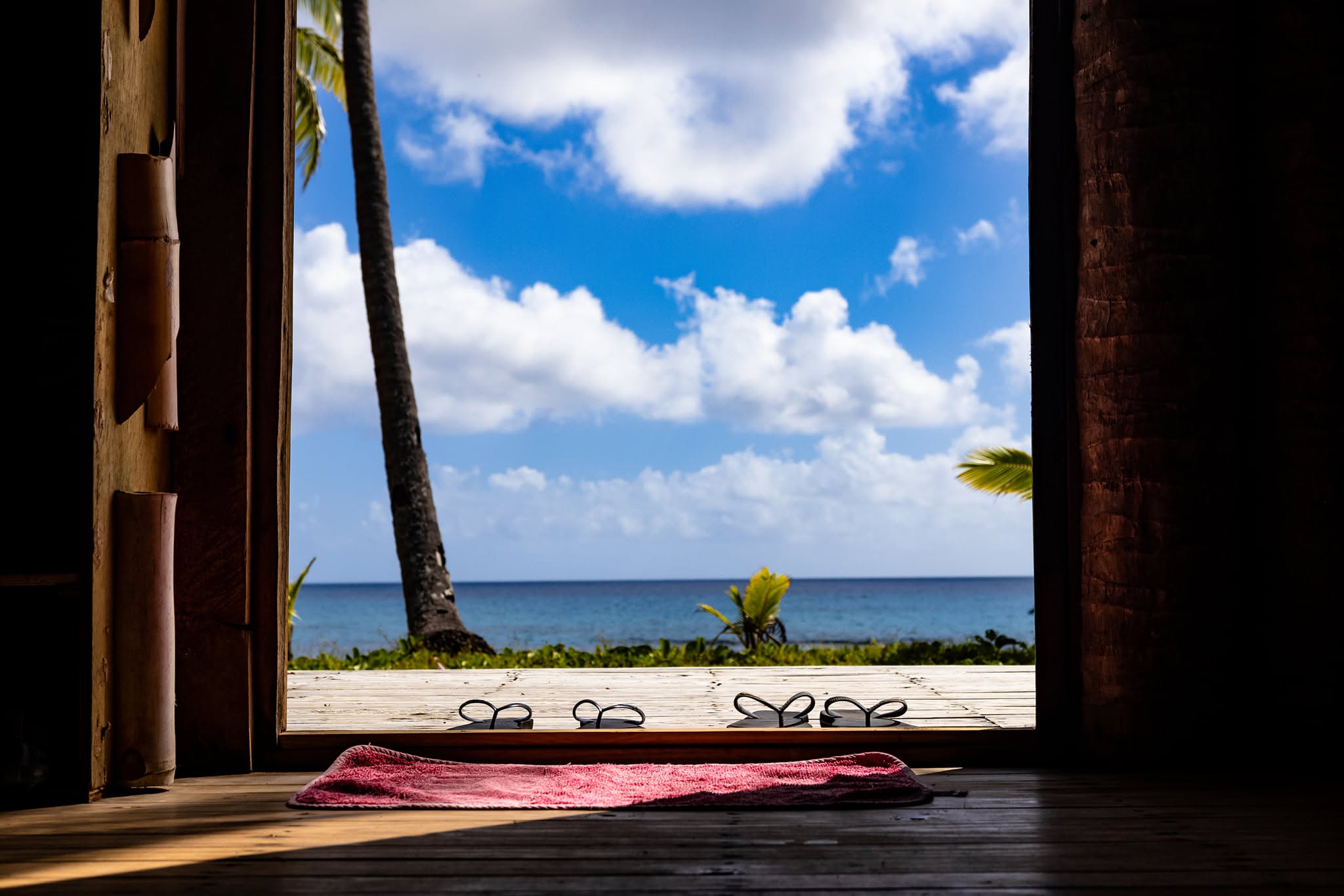 An island view from a traditional doorway