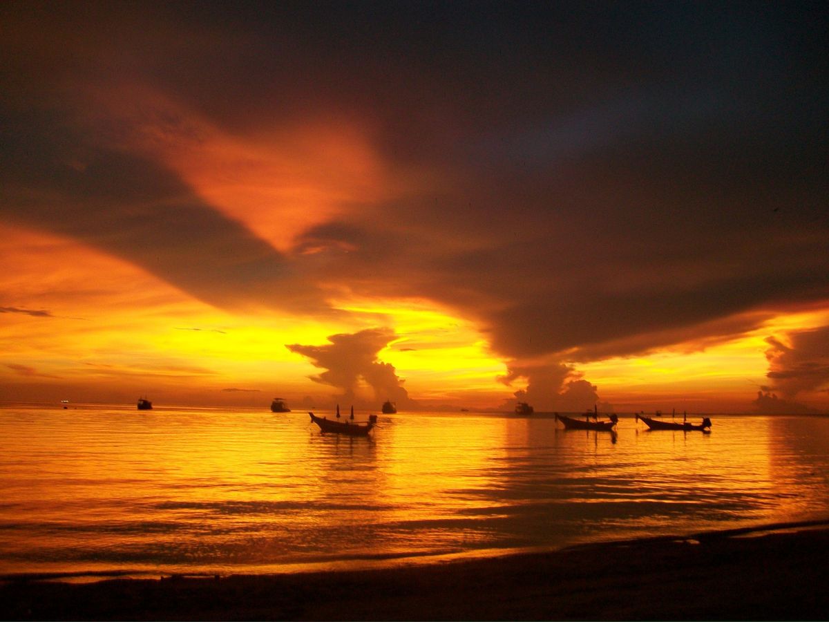 Boats on the Pacific at sunset