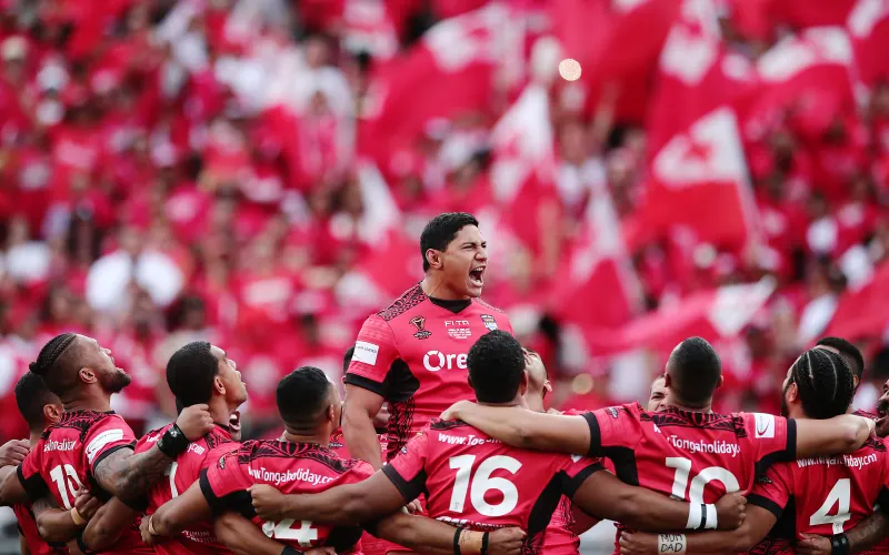 Tongan rugby players celebrating together