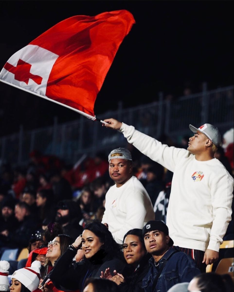 Tongan supporters celebrating together